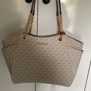 Michael Kors Jet Set travel bag. Size is large.